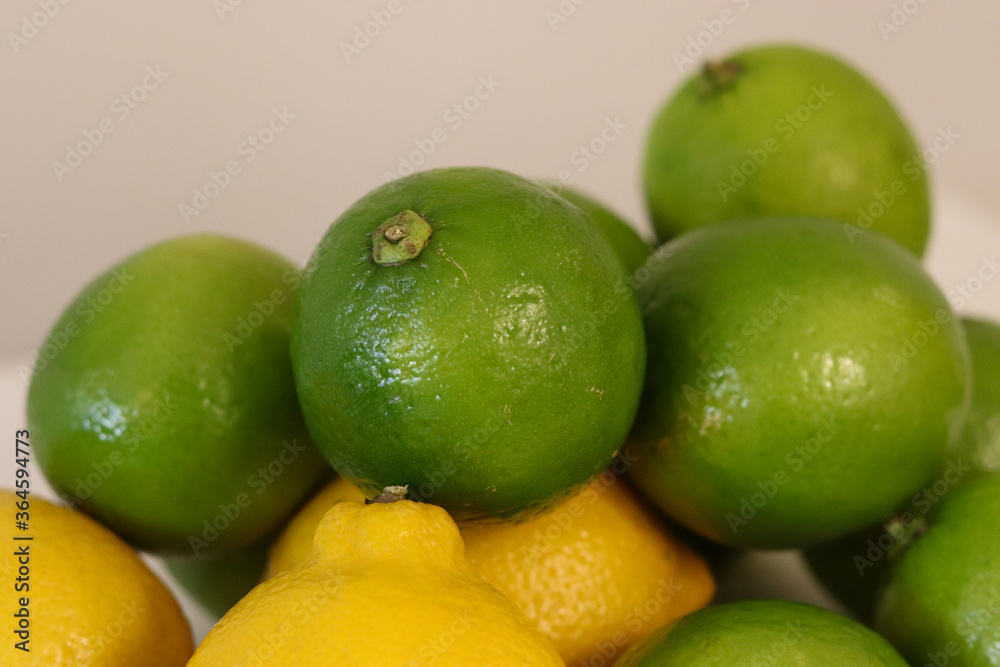 Beautiful lemons arranged on a table. A fruit rich in vitamin c. Beautiful lemons arranged on a table. A fruit rich in vitamin c.
