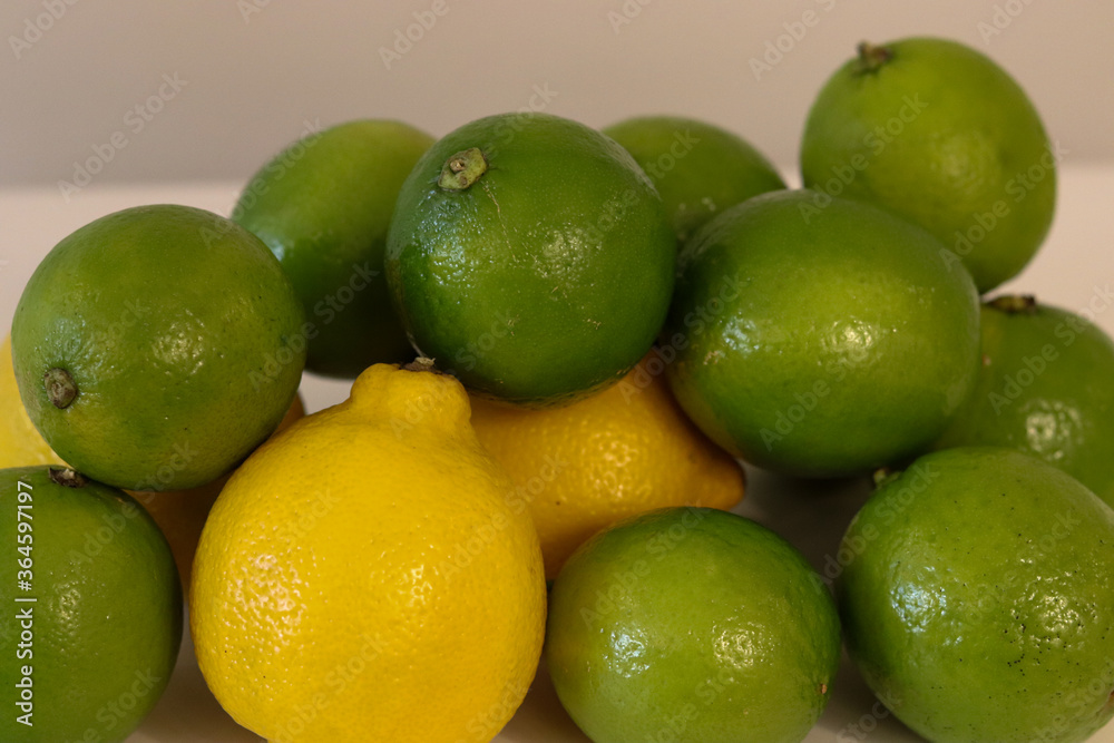 Beautiful lemons arranged on a table. A fruit rich in vitamin c. Beautiful lemons arranged on a table. A fruit rich in vitamin c.