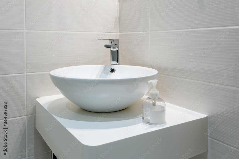 Fototapeta premium White washbasin in the bathroom, in the house, hotel. Conceptual photo.