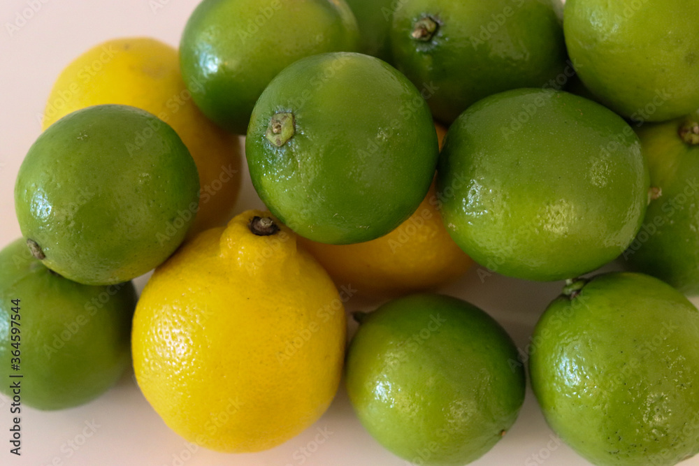 Beautiful lemons arranged on a table. A fruit rich in vitamin c. Beautiful lemons arranged on a table. A fruit rich in vitamin c.