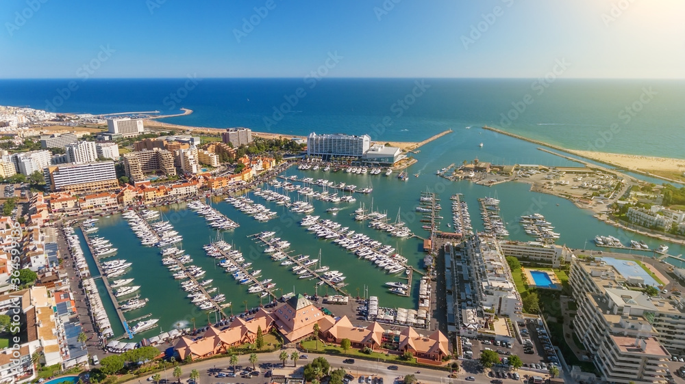 Aerial photo of the bay, Vilamoura, Quarteira, Portugal. Marina with luxury yachts.