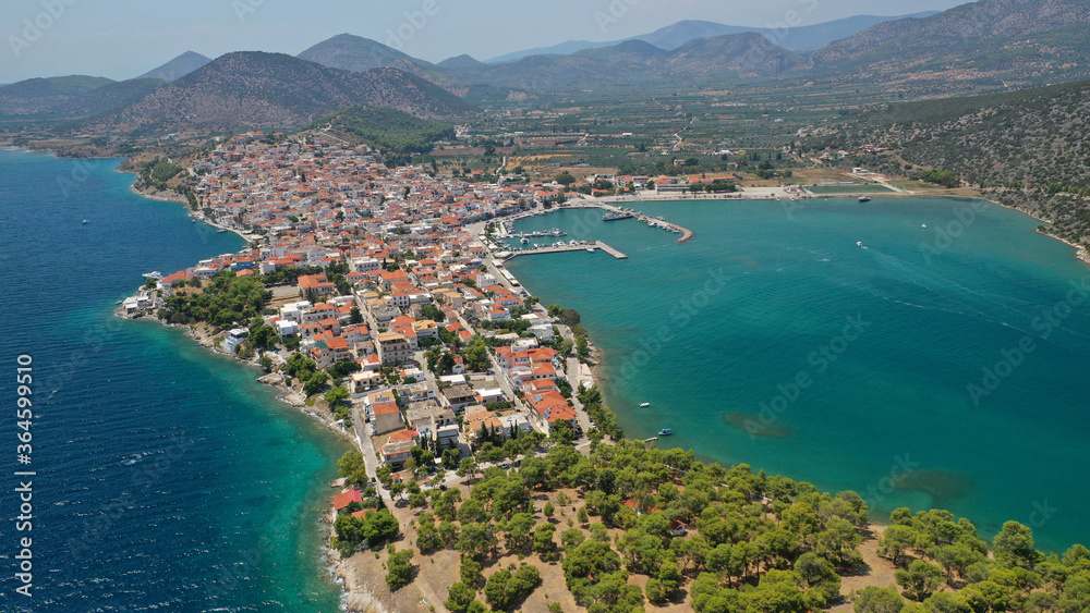 Aerial drone photo of picturesque city of Ermioni built in peninsula with forest of Bistis at the end, Argolida, Peloponnese, Greece