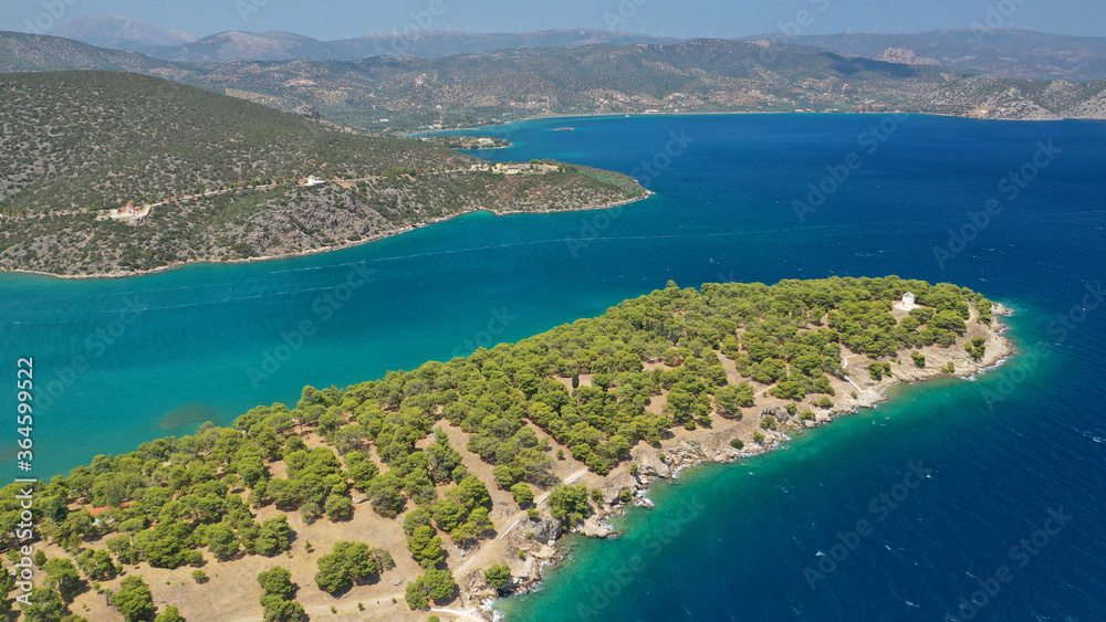 Aerial drone photo of picturesque city of Ermioni built in peninsula with forest of Bistis at the end, Argolida, Peloponnese, Greece Aerial drone photo of picturesque city of Ermioni built in peninsula with forest of Bistis at the end, Argolida, Peloponnese, Greece