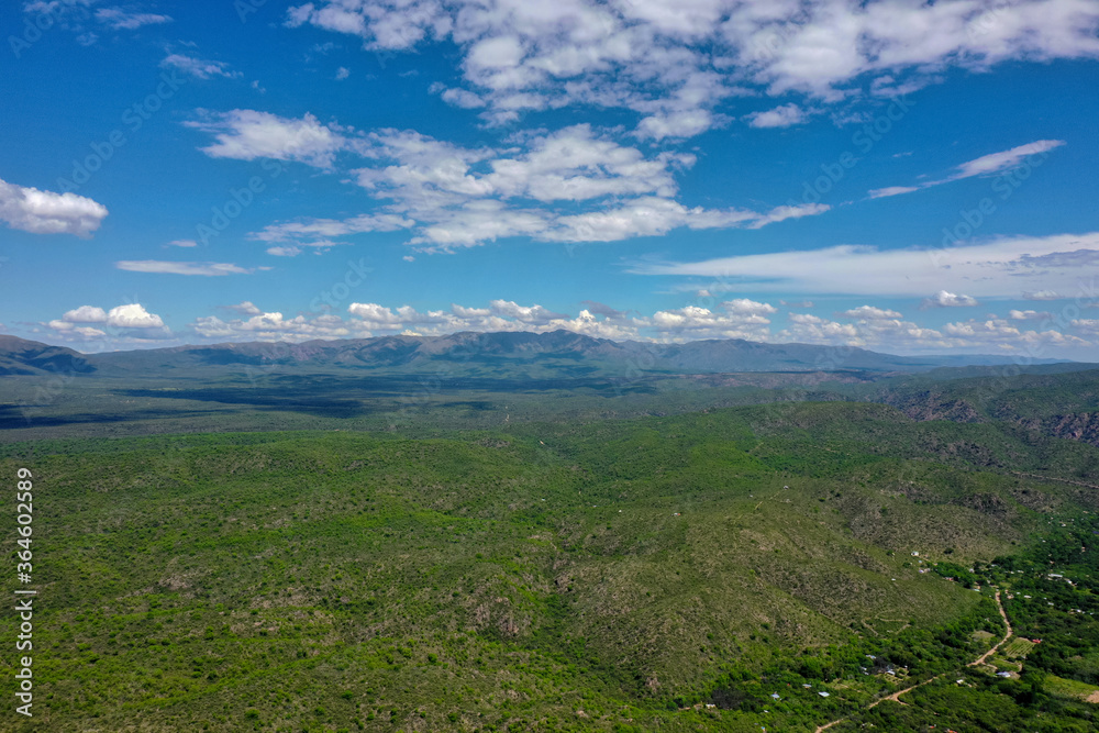 Aerial view of mountains covered with coniferous forests Aerial view of mountains covered with coniferous forests