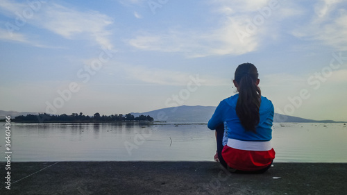 Girl on a lake