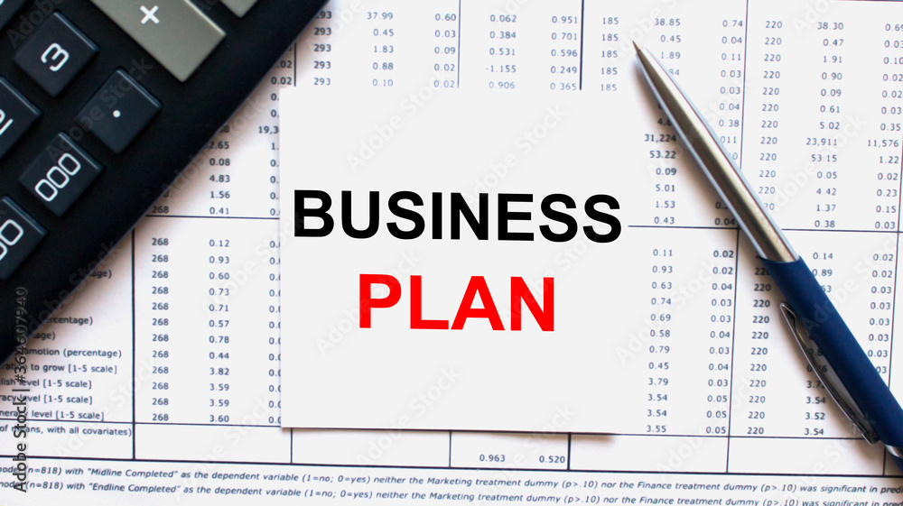 Work smarter text Business Plan on white sheet with pen, calculator and tables Work smarter text Business Plan on white sheet with pen, calculator and tables