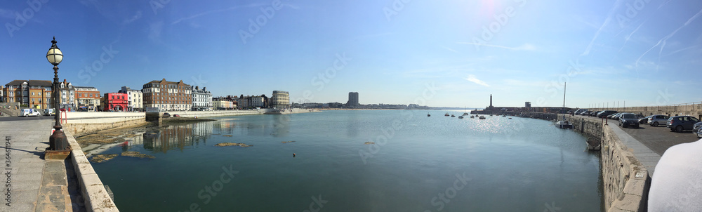 Margate is a town on England’s southeast coast. It's known for its sandy beach. Popular with tourists for its stone pier and wonderful colourful buildings