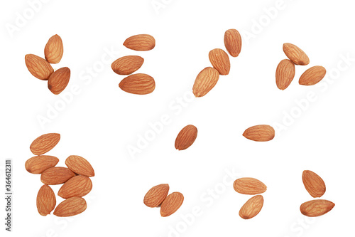 Nut almonds isolated on white one and several