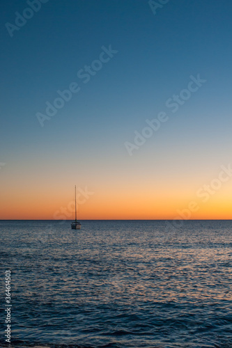 sailboat at sunset © MiekoPhoto