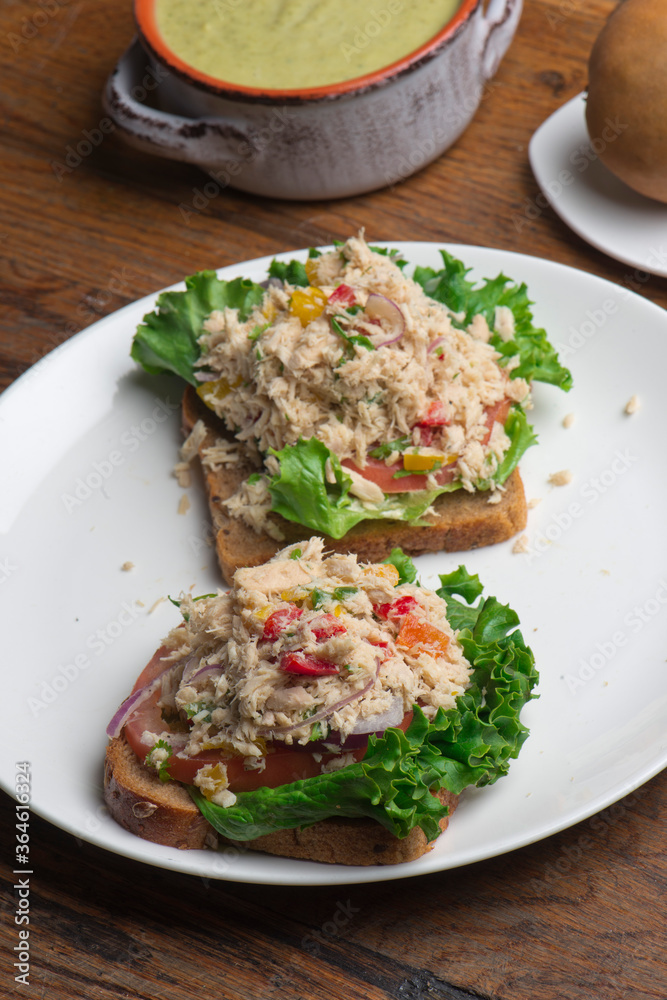 Tuna salad sandwich. Classic traditional American lunch menu item favorite, tuna fish sandwich