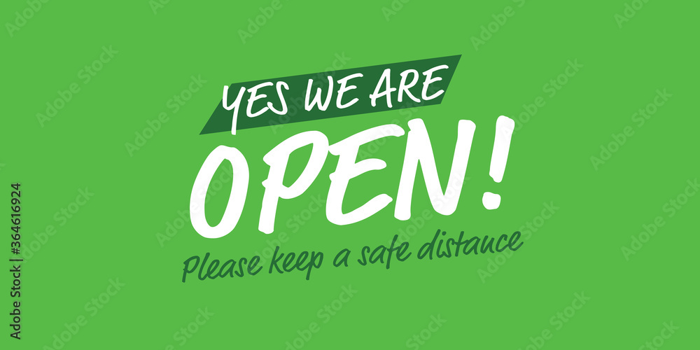 Yes we are open please keep a safe distance banner on green background