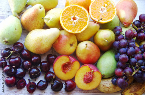 ripe fruits close-up on wooden table