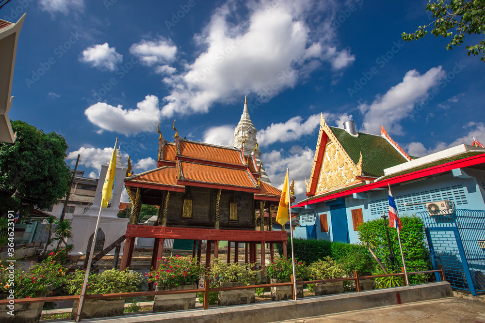 Naklejka premium Background of a large Buddha statue in Bangkok (Wat Pak Nam Phasi Charoen), over 69 meters in height, stands majestically in the capital, a historical and cultural attraction that tourists come to see