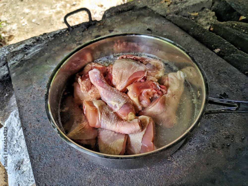 Preparation of chicken stew in rural Guatemala Preparation of chicken stew in rural Guatemala