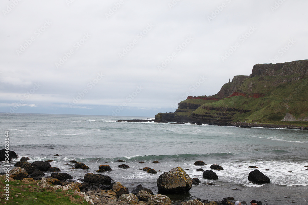 The Giant's Causeway is an area of about 40,000 interlocking basalt columns, the result of an ancient volcanic fissure eruption. It is located in County Antrim on the north coast of Northern Ireland