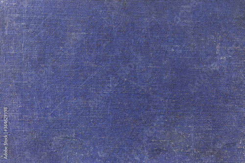Old blue fabric background. Blue canvas. Blue fabric texture. Vintage cloth. Blue cotton