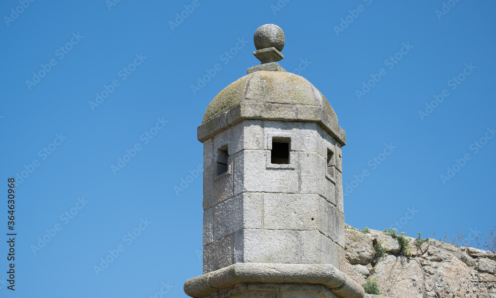 Corner turret of old Napoleonic star fort in Povoa de Varzim, Portugal. Summer day with blue sky.