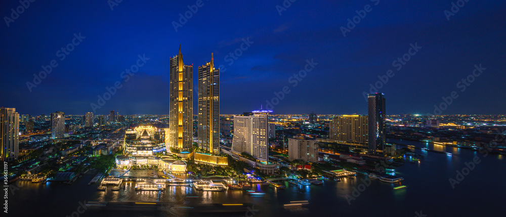 perspective night scenery of Iconsiam is a mixed-use development on Chao Phraya River banks in Bangkok, It includes one of the largest shopping malls in Asia and Magnolias hotels and residences