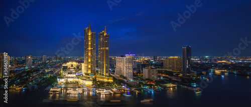 perspective night scenery of Iconsiam is a mixed-use development on Chao Phraya River banks in Bangkok  It includes one of the largest shopping malls in Asia and Magnolias hotels and residences