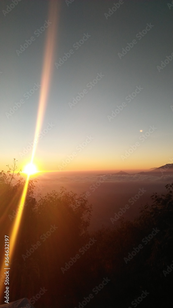 SUNRISE FROM TOP OF MOUNTAIN