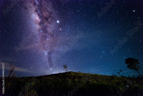 Beautiful nightscape with Starry and Milky Way Galaxy rising in Kudat Sabah North Borneo. Image contain Noise and Grain due to High ISO.