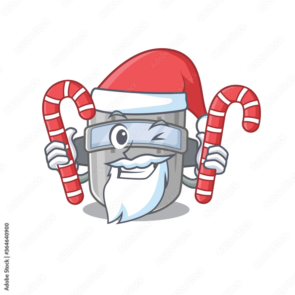 Φωτογραφία Friendly welding mask dressed in Santa Cartoon character with Christmas candies