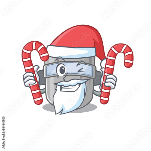 Friendly welding mask dressed in Santa Cartoon character with Christmas candies