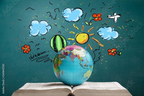 Fototapeta Naklejka Na Ścianę i Meble -  Classic globe planet and open book