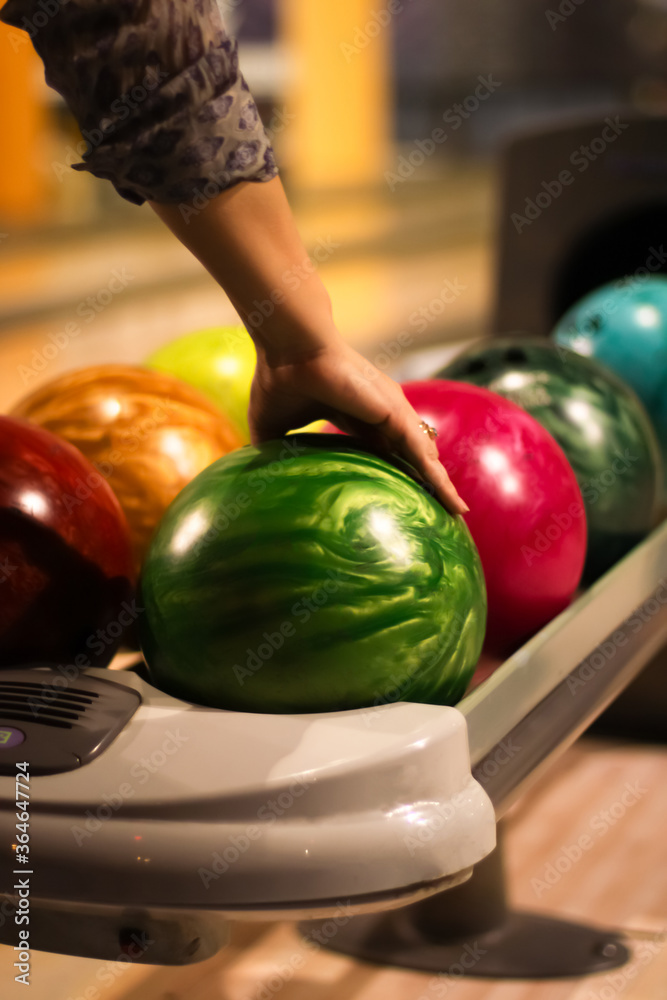 Fototapeta premium Woman arm and bowling ball