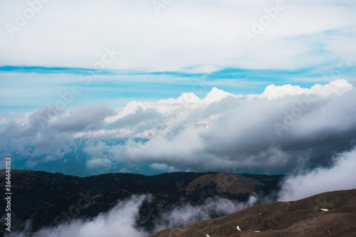 View of the clouds from above in the mountains