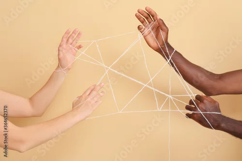 Obraz Hands of Caucasian woman and African-American man on color background. Racism concept