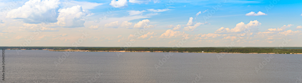Panorama of the wide Volga river with the opposite forest Bank