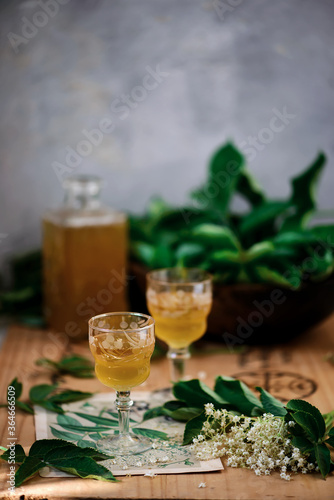 elderflower liquor in the glass.style vintage