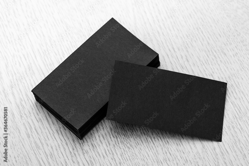 Fototapeta premium Business card on the wooden table.