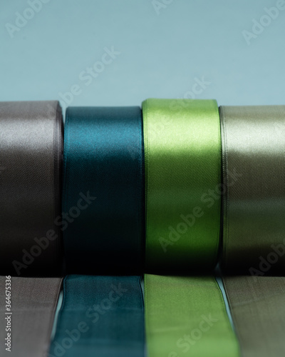 colored packing tape in rolls on colored background