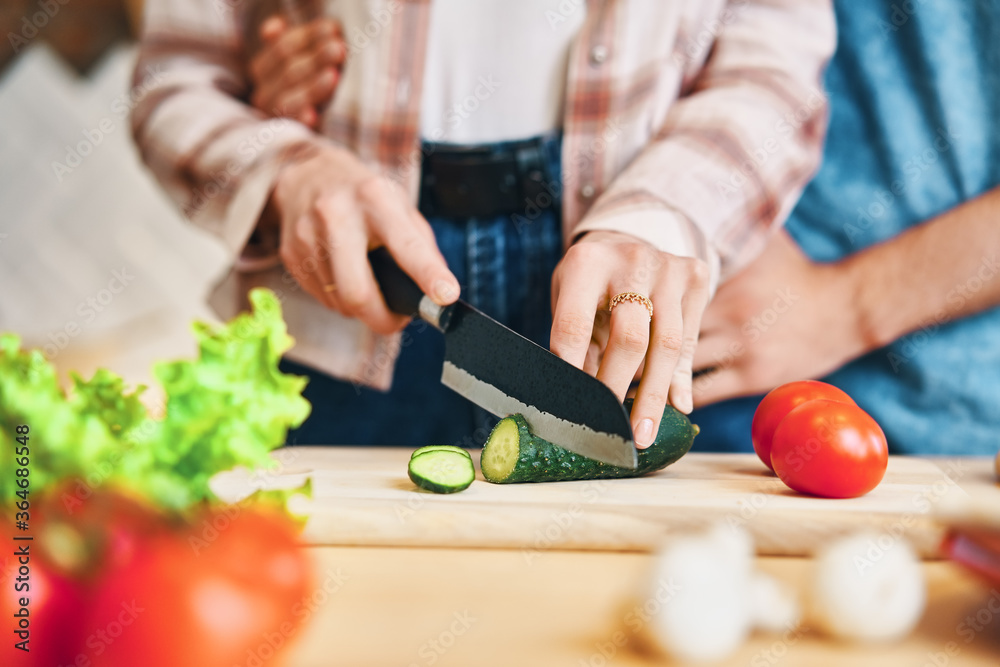 Female cooking healthy food cutting vegetable on kitchen Female cooking healthy food cutting vegetable on kitchen