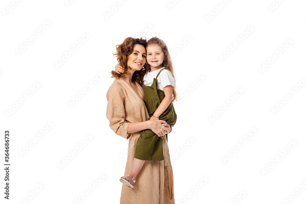 smiling mother holding in arms daughter isolated on white smiling mother holding in arms daughter isolated on white