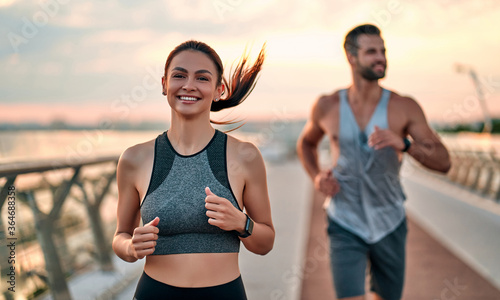 Fototapeta Naklejka Na Ścianę i Meble -  Couple doing sport on the street