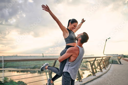 Fototapeta Naklejka Na Ścianę i Meble -  Couple doing sport on the street