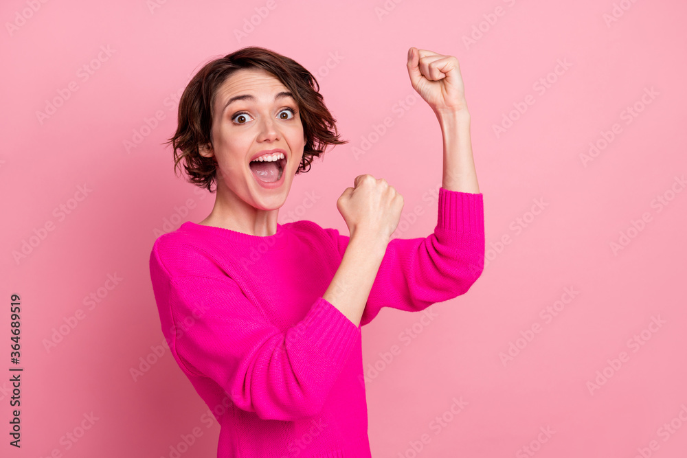 Photo of overjoyed crazy excited lady toothy smiling raise fists screaming nice results achievement success wear casual bright sweater isolated pink pastel color background Photo of overjoyed crazy excited lady toothy smiling raise fists screaming nice results achievement success wear casual bright sweater isolated pink pastel color background