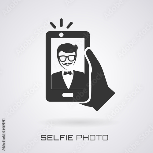 Selfie icon. Trendy man taking a self portrait on smart phone. Vector illustration.