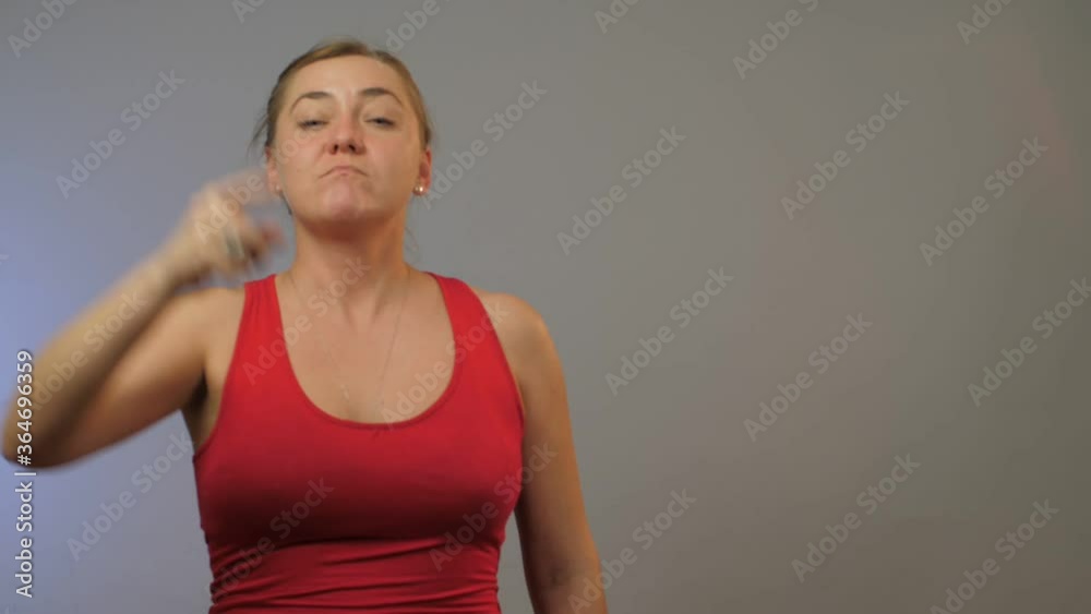 angry lady shakes with index finger playing etude role at dress rehearsal against white studio background close view angry lady shakes with index finger playing etude role at dress rehearsal against white studio background close view