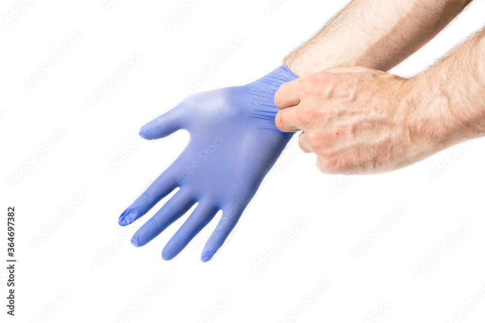 man wears protective medical gloves, protection during a pandemic man wears protective medical gloves, protection during a pandemic