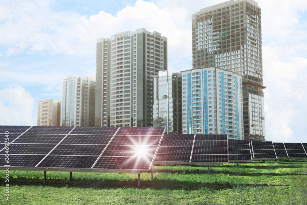 Cityscape and solar panels installed outdoors. Alternative energy source Cityscape and solar panels installed outdoors. Alternative energy source