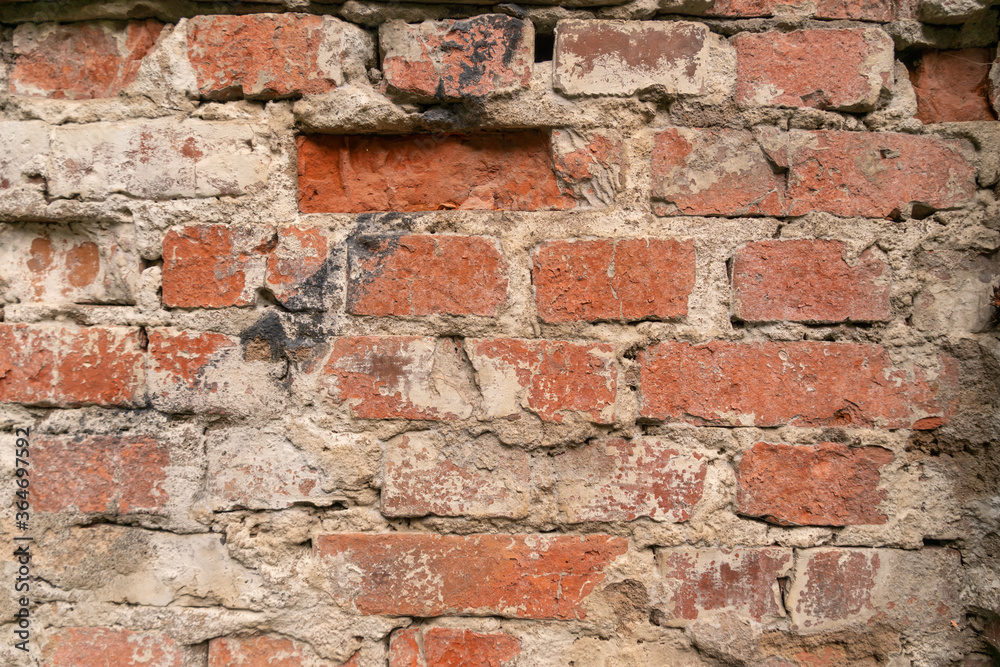 Obraz premium Texture of an old red brick wall, background