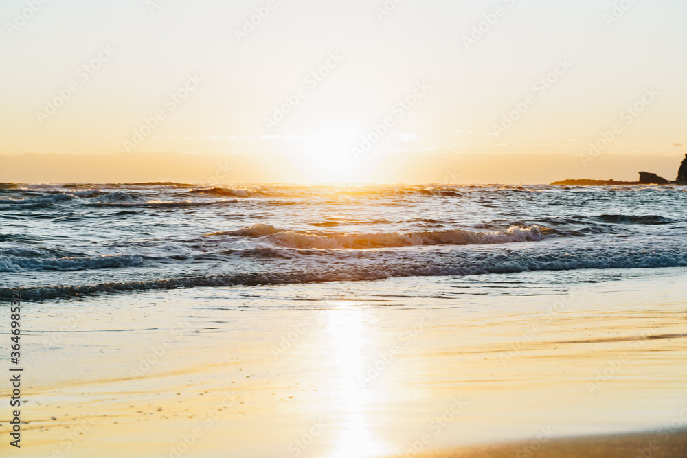 Sunrise on palm beach looking at Currumbin
