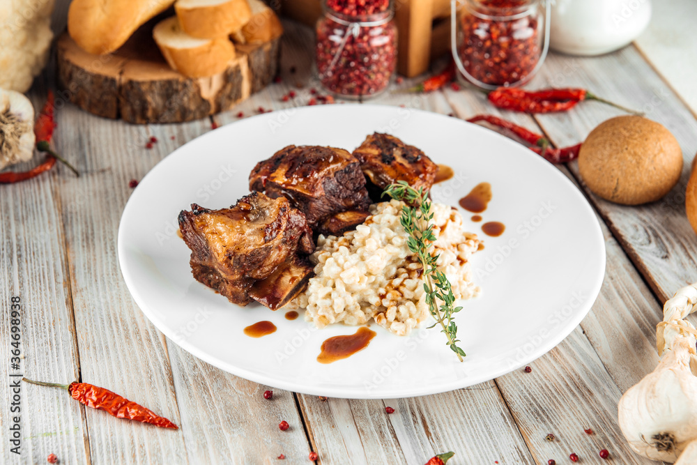 Gourmet beef stewed ribs with pearl barley risotto