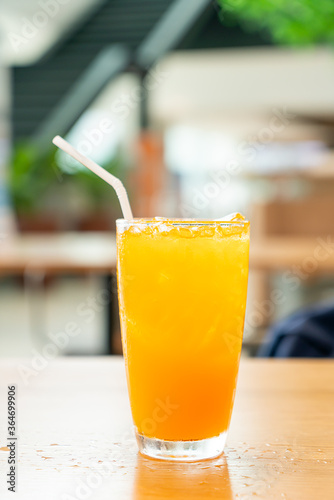 iced orange juice on wood table