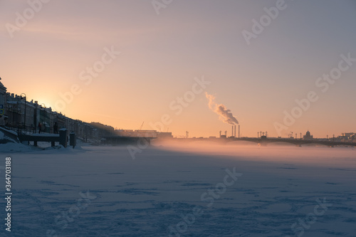 sunset over the ice river © Nikita Satarov