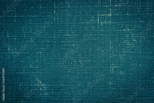 Old grunge blue cotton fabric texture background.